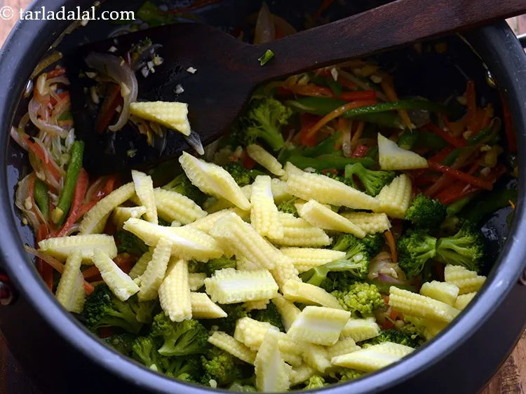 Step 11 – Add baby corn.