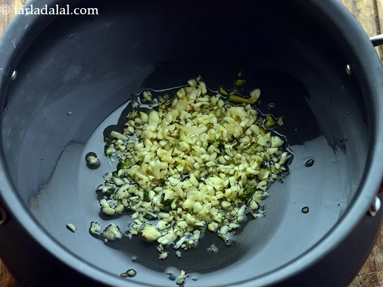 Step 4 – Add garlic and celery.