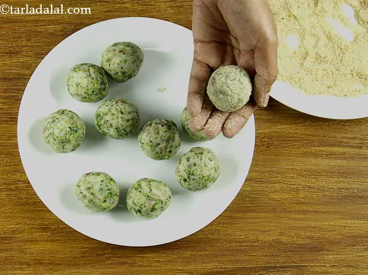 Step 18 – Roll the ball in bread crumbs till it is evenly coated from all the sides. …