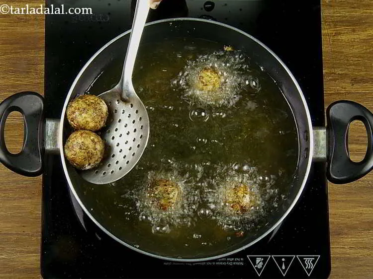 Step 22 – Deep fry the <strong>Broccoli Cheese Balls</strong> on a medium flame till they turn golden brown …