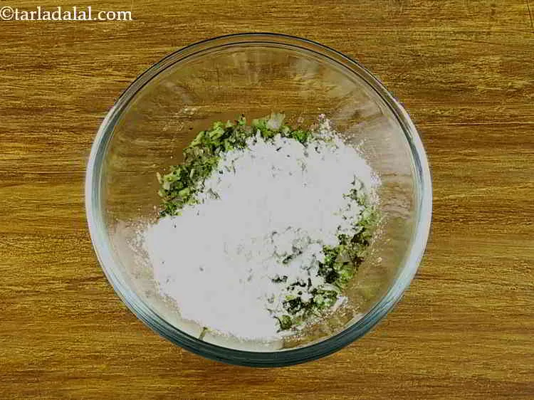 Step 9 – Add the cornflour. It helps in binding together all the ingredients for the <strong>Broccoli Cheese …