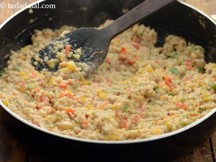 Step 25 – Mix well and cook <strong>easy brown rice risotto</strong> on medium flame for 3-4 minutes, while …