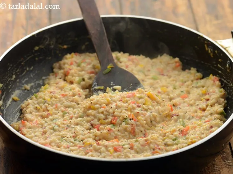 Step 29 – Cook<strong> healthy brown rice vegetable risotto</strong> on medium flame for another 1 minute, while stirring …