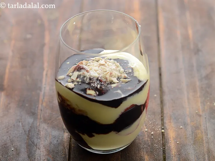 स्टेप 30 – अंत में, इसके ऊपर १ टेबलस्पून मिले-जुले मेवे छिड़कें। ये …