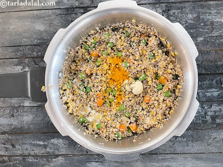 Step 28 – Add&nbsp;<meta charset="UTF-8" />1/4 tsp&nbsp;<a href="glossary-turmeric-powder-haldi-645i">turmeric powder (haldi)</a>.