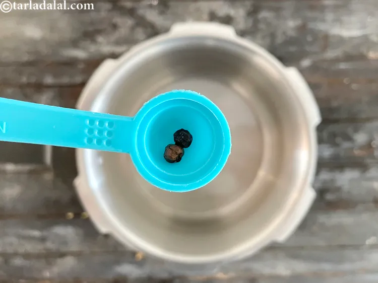 Step 19 – Add&nbsp;<meta charset="UTF-8" />2&nbsp;<a href="glossary-black-peppercorns-kali-mirch-kalimirch-566i">black peppercorns (kalimirch)</a>.