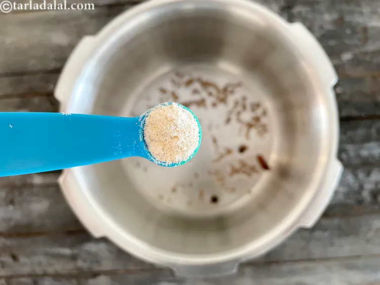 Step 23 – Add&nbsp;<meta charset="UTF-8" />1/4 tsp&nbsp;<a href="glossary-asafoetida-hing-113i">asafoetida (hing)</a>.