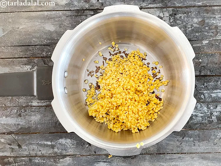 Step 24 – Add washed and drained&nbsp;<meta charset="UTF-8" />1/2 cup&nbsp;<a href="glossary-yellow-moong-dal-split-yellow-gram-peeli-moong-dal-488i">yellow moong dal (split yellow gram)</a>. See above …