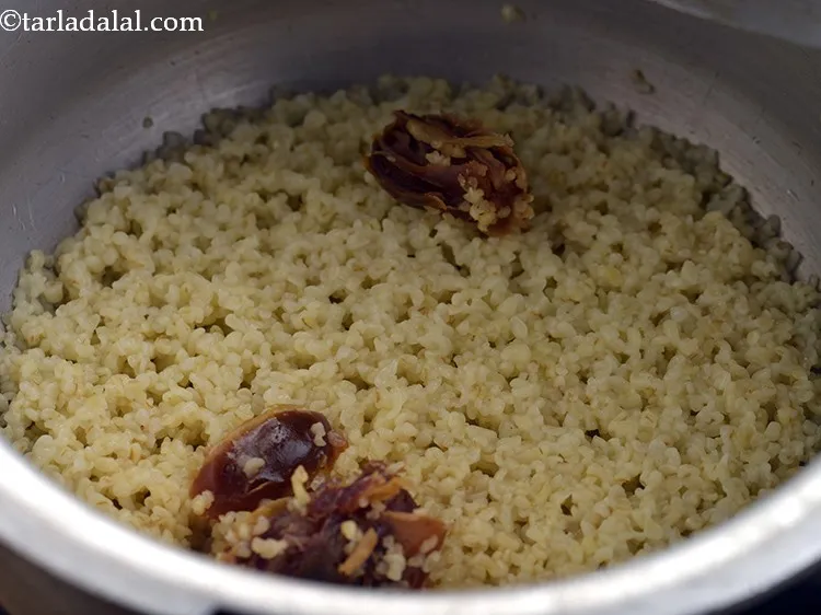 Step 16 – This is how the mixture looks after pressure cooking. Let the mixture to cool slightly …