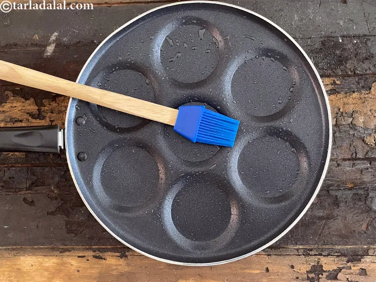 Step 14 – Greasing the uttapa pan lightly is very important, else it would be difficult to remove …