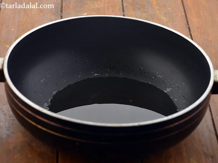 Step 14 – Heat the oil in a deep non-stick pan.