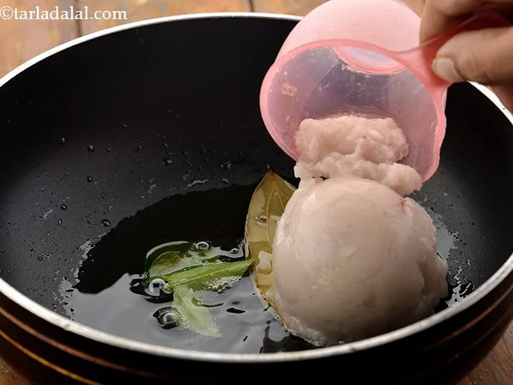 Step 16 – Add the curry leaves and onions.