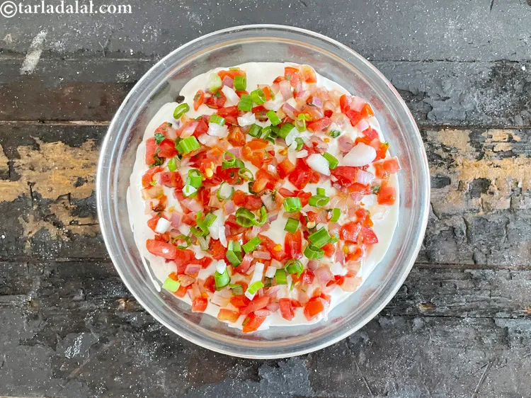 Step 87 – Sprinkle &frac12; tbsp of spring onion whites and greens evenly over it.