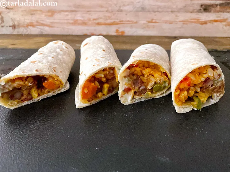Step 128 – Cut the burrito into 2 at an angle. Complete making your balance burritos and enjoy …