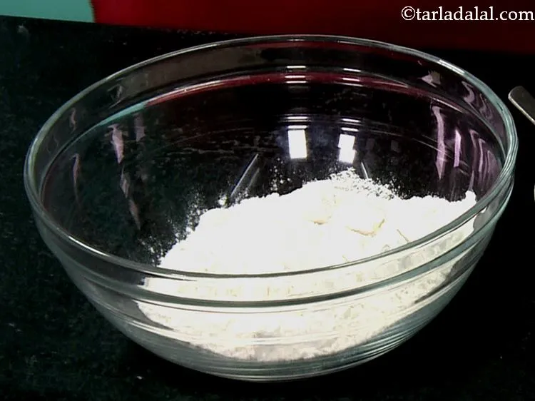 Step 5 – Take a deep bowl and plain flour into it.
