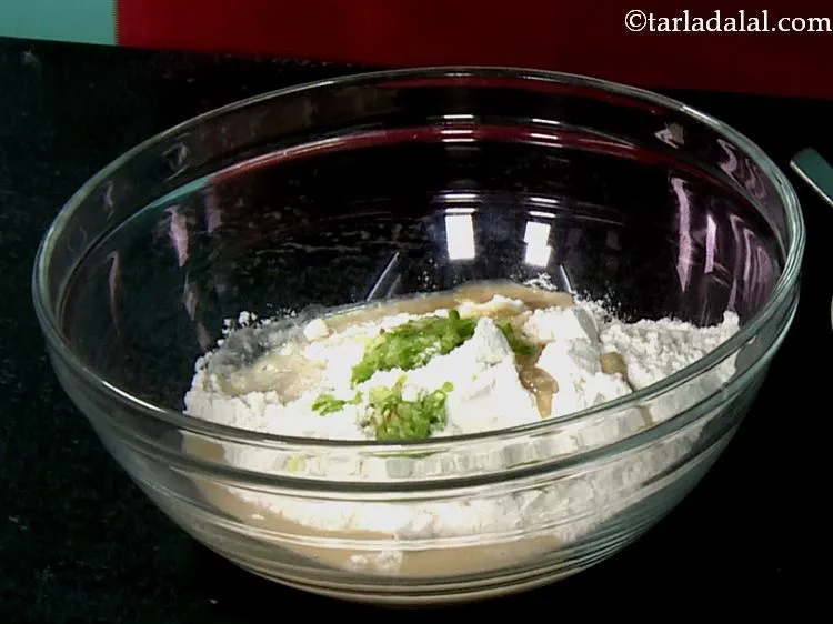 Step 7 – Add the coarse garlic paste to flavour the dough.