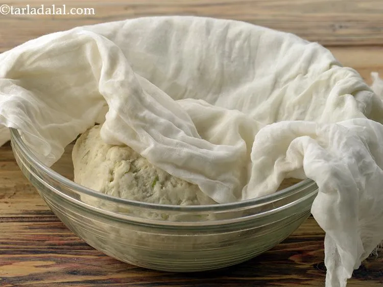 Step 12 – Cover the dough with a lid or a damp muslin cloth to prevent it from …