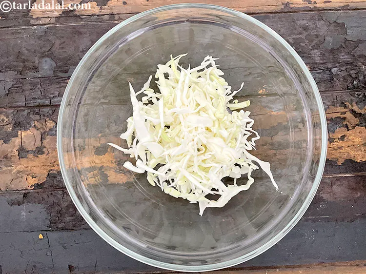 Step 16 – In a deep bowl, put&nbsp;<meta charset="UTF-8" />1 cup&nbsp;<a href="glossary-shredded-cabbage-763i">shredded cabbage</a>. See why we love cabbage.&nbsp;<meta …