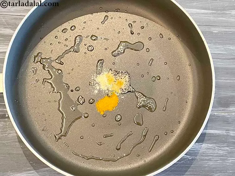 Step 5 – Add the turmeric powder.