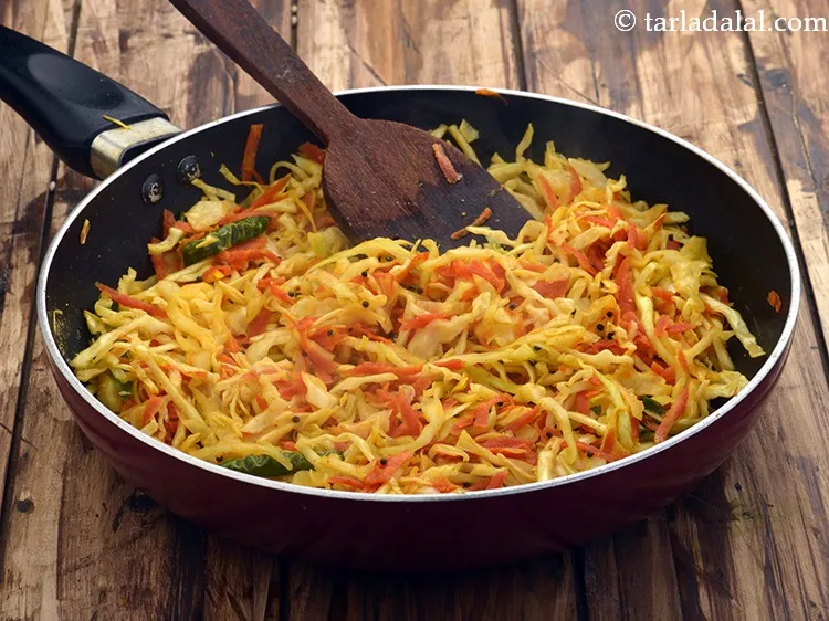 Step 27 – Mix well and cook on a medium flame for 1 minute.