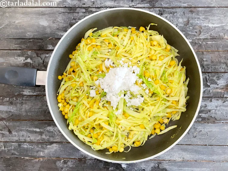 Step 28 – Add&nbsp;<meta charset="UTF-8" />1/4 cup&nbsp;freshly&nbsp;<a href="glossary-grated-coconut-852i">grated coconut</a>.