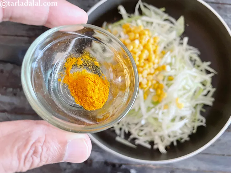 Step 25 – Add&nbsp;<meta charset="UTF-8" />1/4 tsp&nbsp;<a href="glossary-turmeric-powder-haldi-645i">turmeric powder (haldi)</a>.