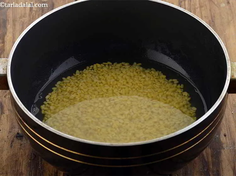 Step 4 – Combine the drained yellow moong dal and ? cup of water in a broad non-stick …