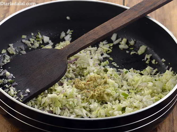 Step 15 – Add the grated ginger. It provides a zingy flavour to the stuffing.