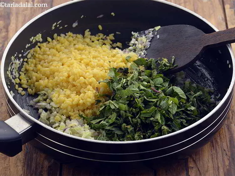 Step 18 – Add the mint leaves. You can substitute mint leaves with coriander leaves.