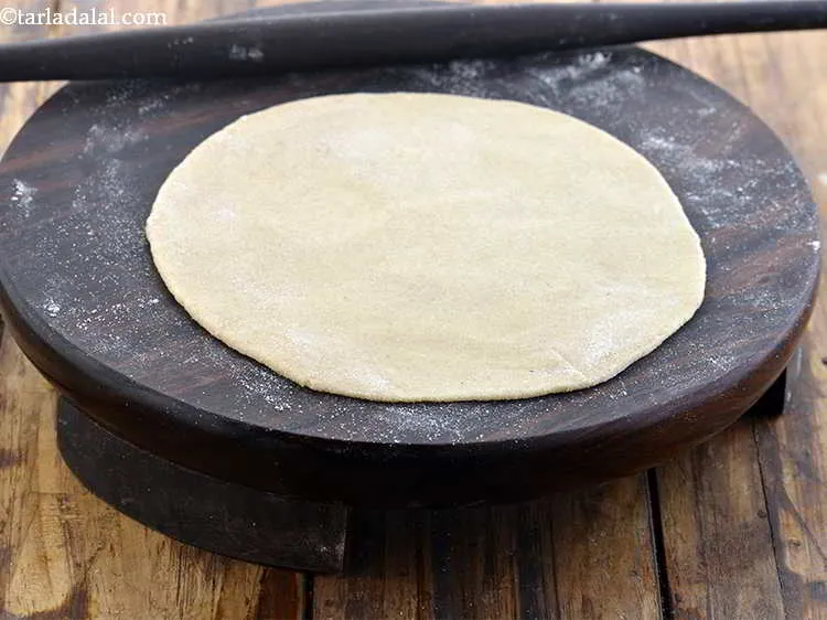 Step 24 – Roll out one portion of the dough into a 150 mm. (6?) diameter circle using …