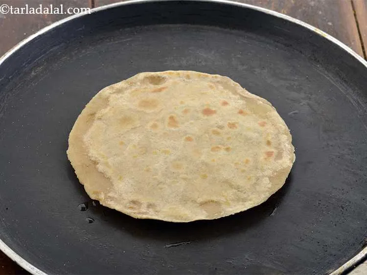 Step 21 – Cook on one side till light brown spots appear and then flip the<strong> Cabbage and …