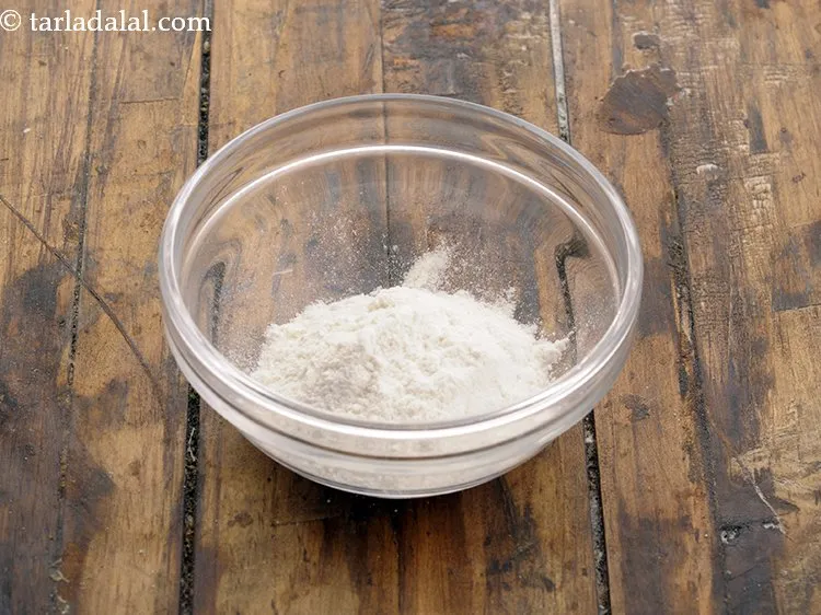 Step 10 – To seal the edges of <strong>bread paneer and cabbage rolls</strong>, in a small bowl take …