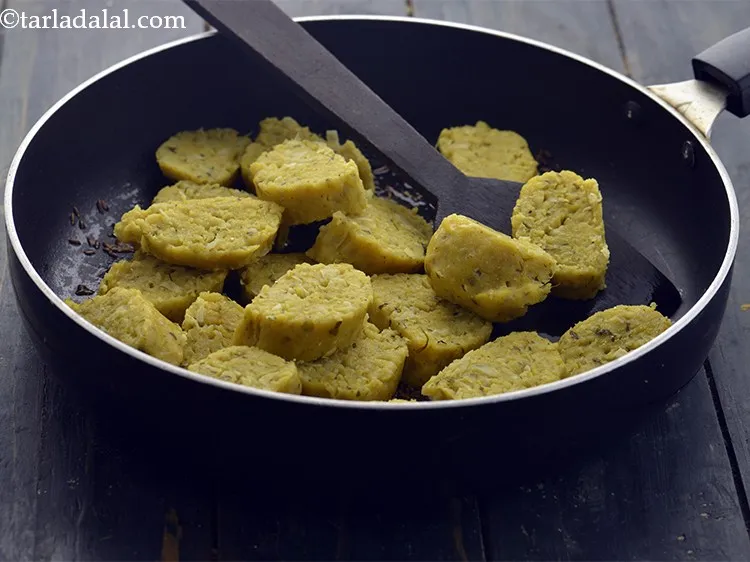 Step 24 – Add the sliced <strong>muthias</strong>.