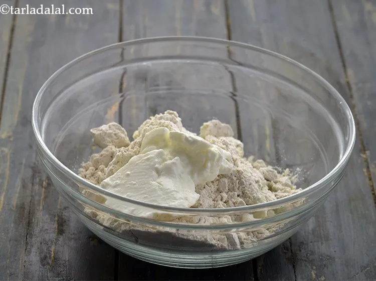 Step 5 – Add the curd. We have used fresh curd which will make the <strong>muthia</strong> soft.Check out …