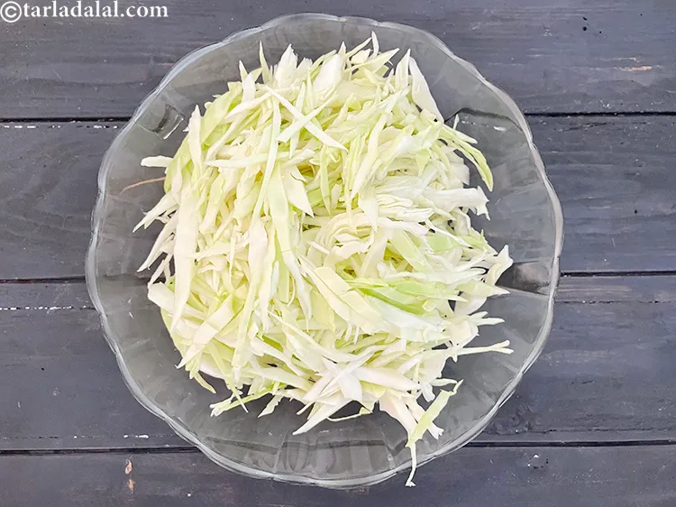 Step 4 – Shred the cabbage. We need&nbsp;<meta charset="UTF-8" />3 cups&nbsp;<a href="glossary-shredded-cabbage-763i">shredded cabbage</a>.