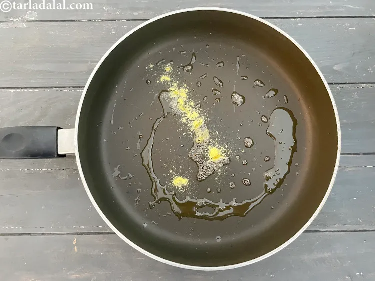 Step 10 – Add&nbsp;<meta charset="UTF-8" />1/4 tsp&nbsp;<a href="glossary-asafoetida-hing-113i">asafoetida (hing)</a>.