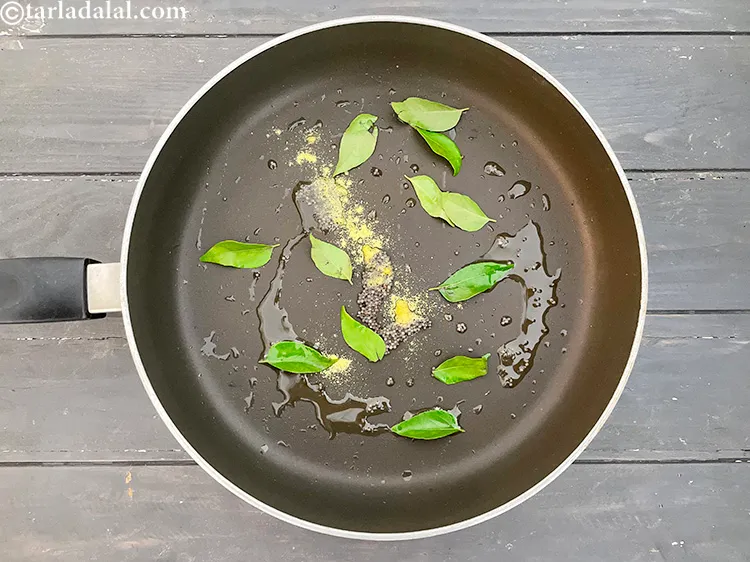 Step 11 – Add&nbsp;<meta charset="UTF-8" />12&nbsp;<a href="glossary-curry-leaves-kadi-patta-kadipatta-388i">curry leaves (kadi patta)</a>.