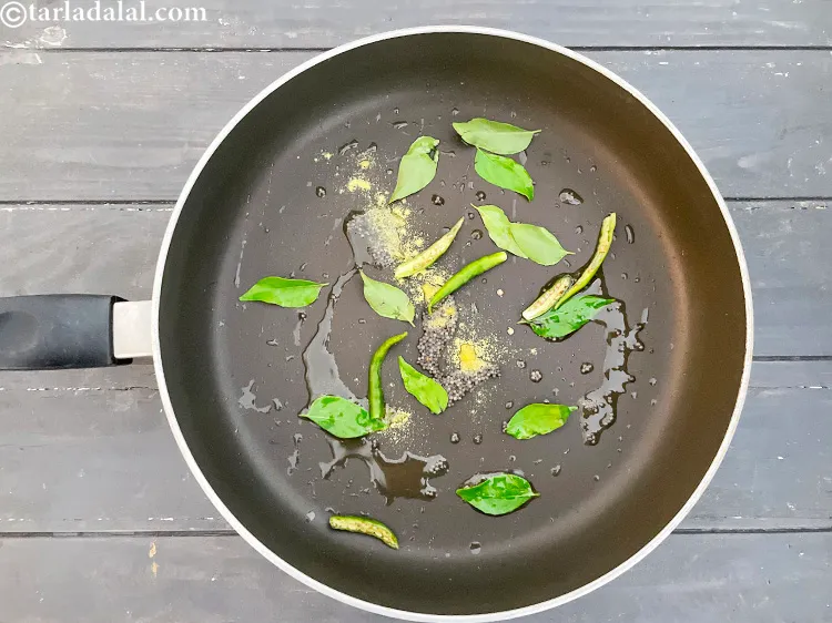 Step 12 – Add&nbsp;<meta charset="UTF-8" />3&nbsp;<a href="glossary-slit-green-chillies-1856i">slit green chillies</a>.