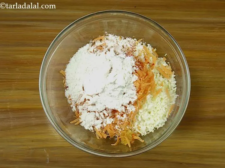 Step 15 – Add the plain flour. It is used for binding the vegetables togeather.