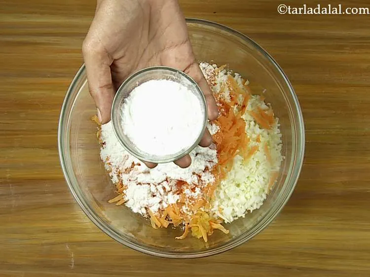 Step 16 – Add the cornflour. It is used to give crispiness to the <strong>Cabbage Manchurian.</strong>