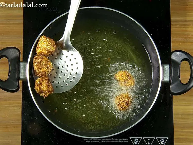 Step 23 – Heat the oil for deep-frying in a deep non-stick pan, and deep-fry 5 balls at …