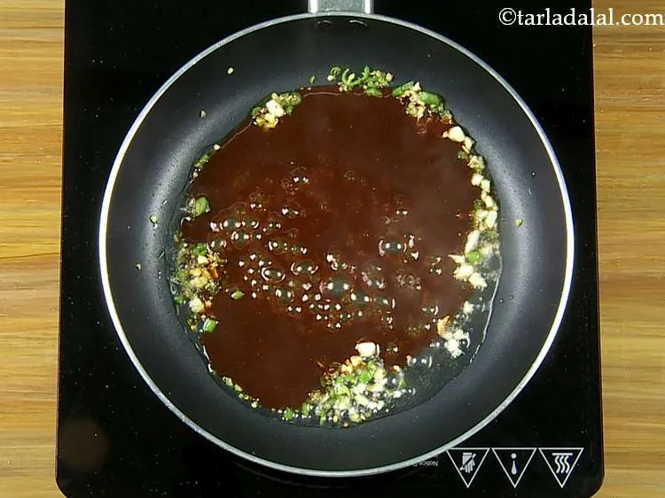 Step 29 – Add the prepared <strong>Cabbage Manchurian sauce</strong>.&nbsp; If you feel it is very thick you can …