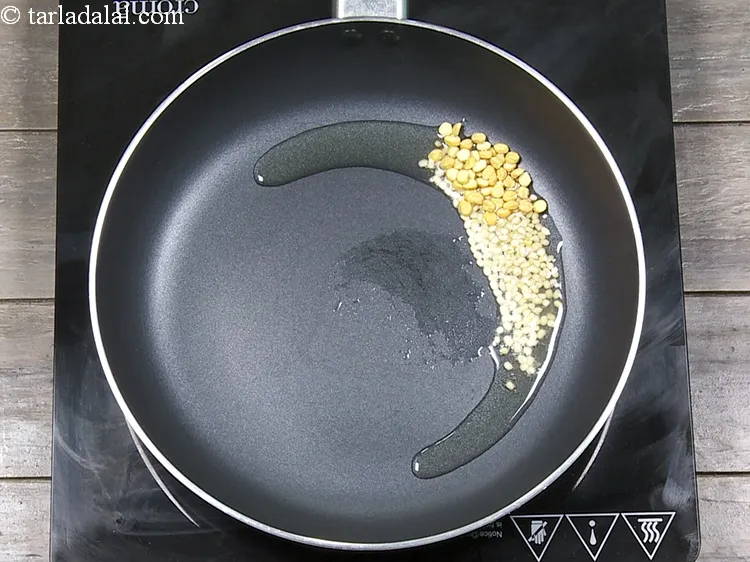 Step 5 – Add 1 tsp&nbsp;<a href="https://www.tarladalal.com/glossary-chana-dal-split-bengal-gram-285i">chana dal (split bengal gram)</a>.&nbsp;One cup of cooked&nbsp;<a href="https://www.tarladalal.com/recipes-using-chana-dal-285">Chana Dal</a>&nbsp;provides 33% of …