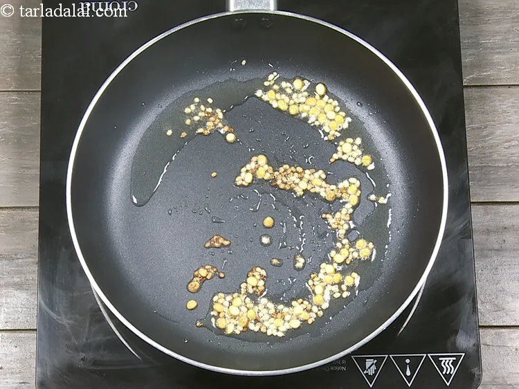Step 6 – Saut&eacute; on a medium flame for 1 minute. Be careful the dal should not burn. …