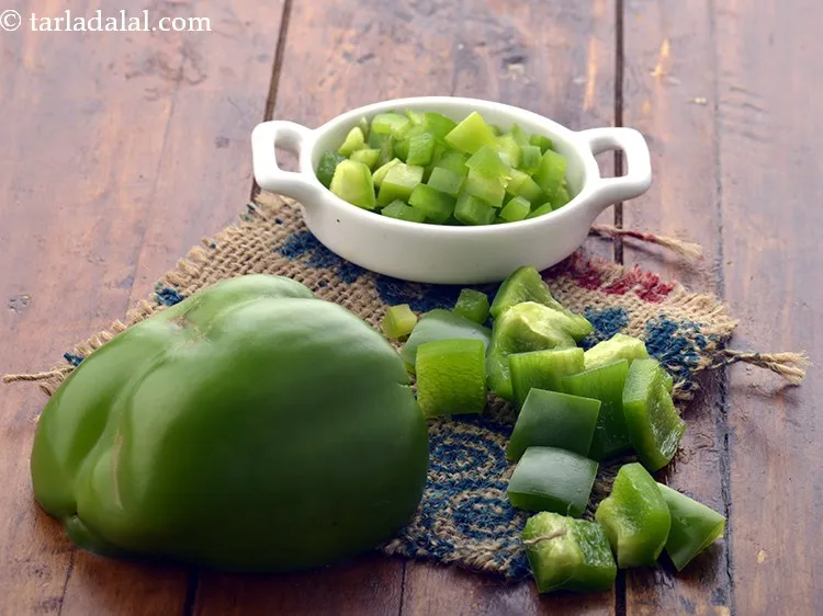 Step 25 – <span style="font-size:18px"><strong>Tips for rava dhokla with stuffed schezwan filling.&nbsp;</strong></span>While we have used colourful capsicum, if …