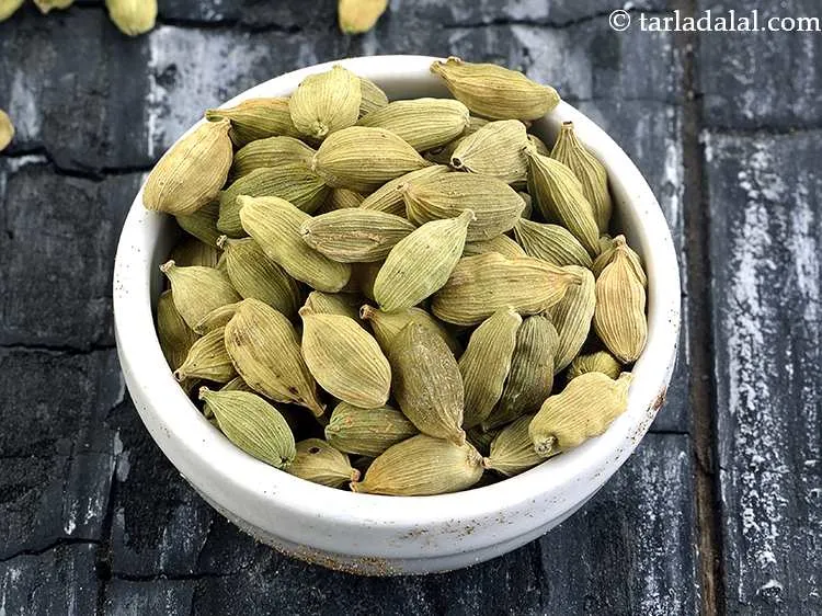 Step 32 – Add 3&nbsp;<a href="https://www.tarladalal.com/glossary-cardamom-elaichi-262i">cardamoms</a>.