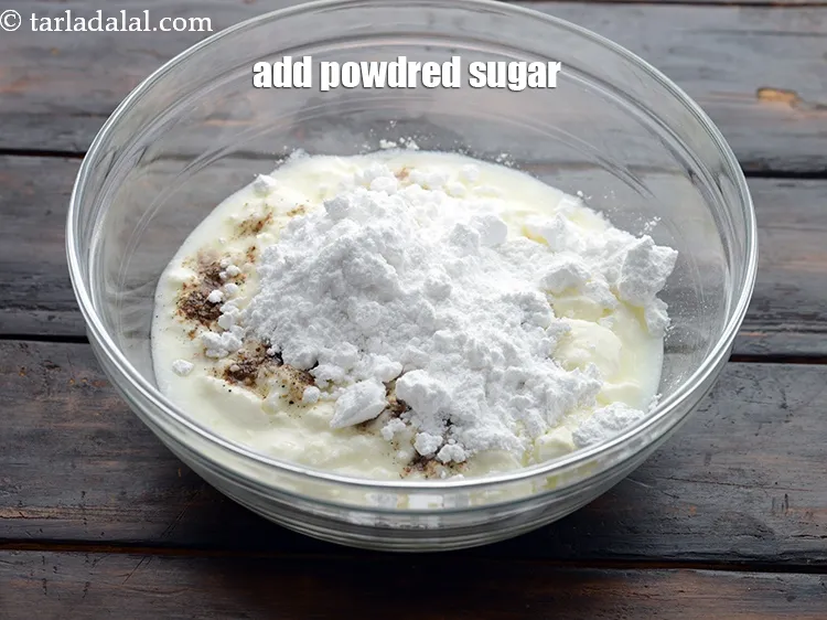 Step 13 – Add 5 1/2 tbsp&nbsp;<a href="https://www.tarladalal.com/glossary-powdered-sugar-280i">powdered sugar</a>.&nbsp;
