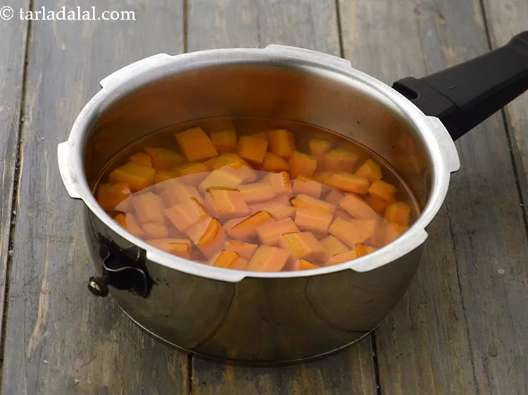 Step 12 – Mix well and pressure cook for 2 whistles. Allow the steam to escape before opening …