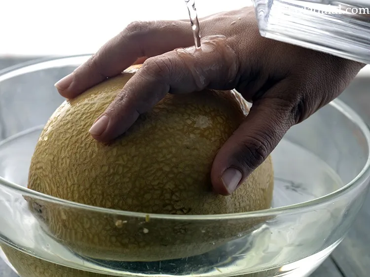 Step 14 – Secondly, wash the muskmelon to remove dirt if any.&nbsp;