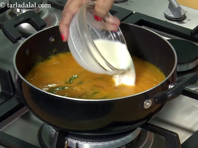 Step 28 – <p>Add 1/2 cup&nbsp;<a href="https://www.tarladalal.com/glossary-milk-doodh-full-fat-milk-buffalo-milk-full-cream-milk-514i">milk</a>.&nbsp;1 cup of&nbsp;<a href="https://www.tarladalal.com/recipes-using-milk-514">milk</a>&nbsp;provides 70% of the Recommended Daily Allowance of&nbsp;<a href="https://www.tarladalal.com/recipes-for-Calcium-Rich-375">Calcium</a>. …